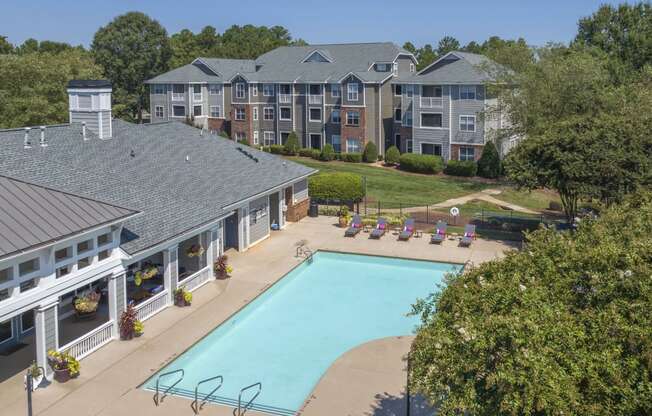 Arial view of Seasons at Umstead apartments in Raleigh with pool and lounge chairs