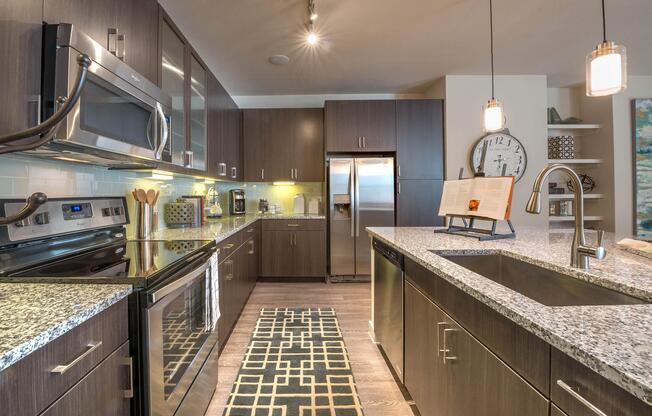 a modern kitchen with stainless steel appliances
