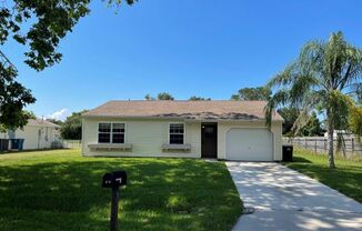 Cute as a button home with high ceilings and granite counters