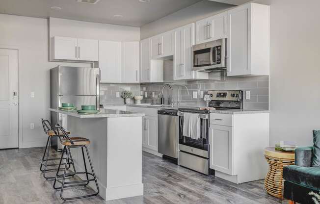 Kitchen with Stainless Steel Appliances and Kitchen Island.