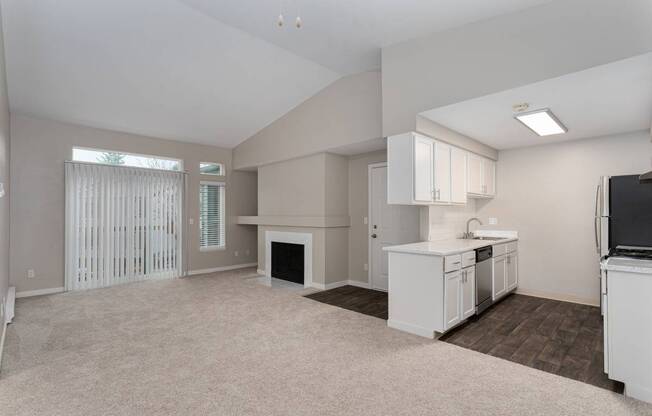 Novela Apartments Kitchen and Living Space with Fireplace