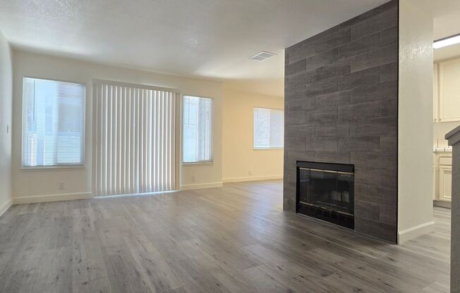 Large Downstairs Condo in Nice Community, New Wood Flooring, Fresh Paint, Garage, Great Location!