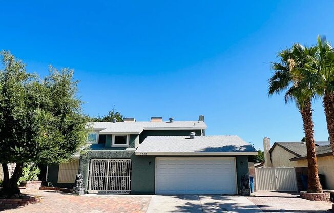 Gorgeous 4 Bed 2.5 Bath in a prime location! Home is over 2200 Sq Ft with a pool on a huge lot! Separate living room, dining room, and family room! Beautiful kitchen with stainless steel appliances built into the white cabinets!