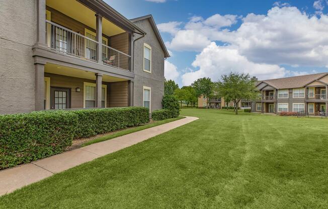 a large lawn in front of a house