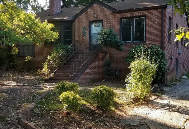 City of East Point Renovated Tudor Style Home
