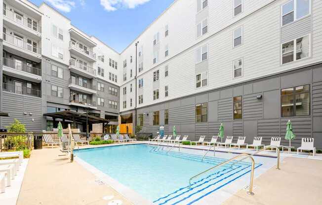 Alton Mill District Apartments in Charlotte, North Carolina Pool with Lounge Chairs
