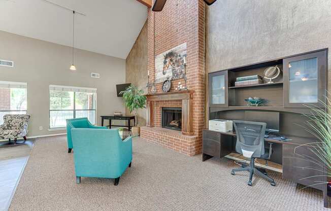 A room with a fireplace and a chair.