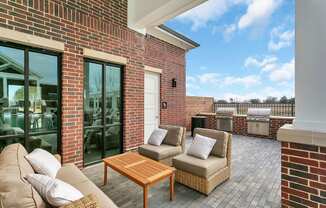 Outdoor seating and the Grilling station with 2 gas grills and an ice maker at McKinney Village, Texas, 75069