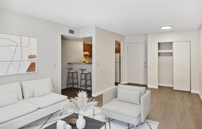 Mode living room with view of kitchen