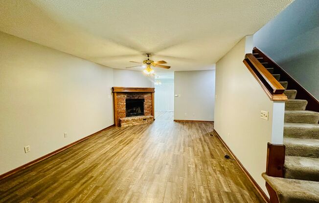 {7209} Spacious Townhome Available Immediately + Fresh Paint & New Carpeting + Two Car Garage