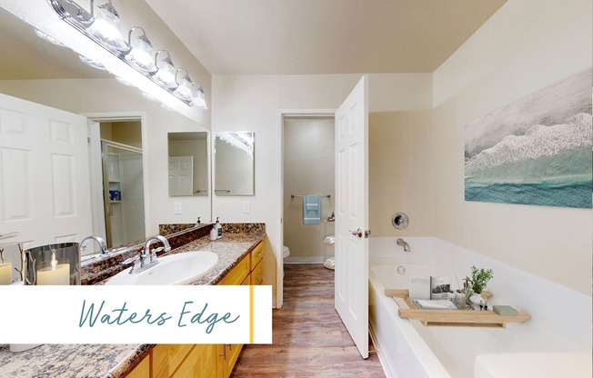 A bathroom with a large mirror and a bathtub at Marina Harbor, California, 90292
