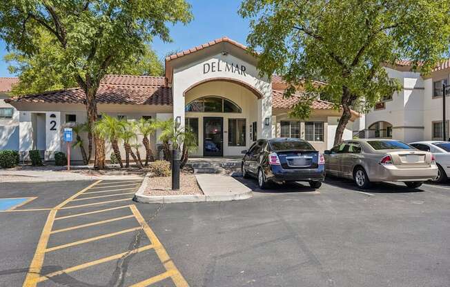 Cars parked in front of a Del Mar building.