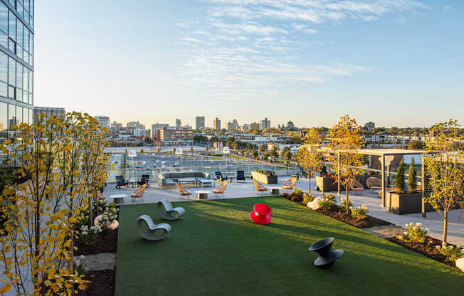 A green space with a view of the city skyline.