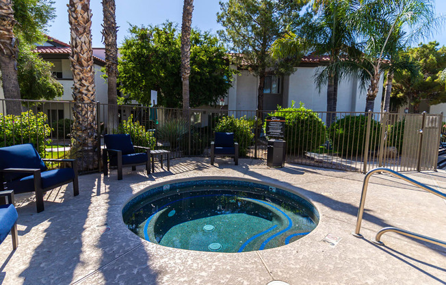 our hot tub is located in the backyard of our apartments