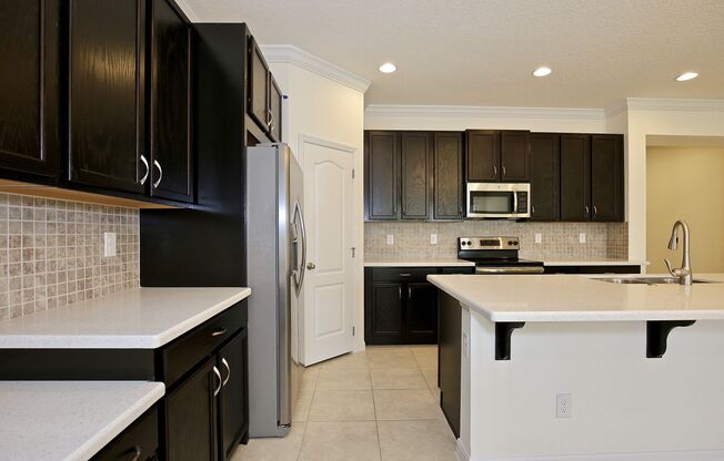 Modern 3/2.5 Spacious Townhome with Gorgeous Lake Views and 1 Car Garage in Thornbrooke - Sanford!
