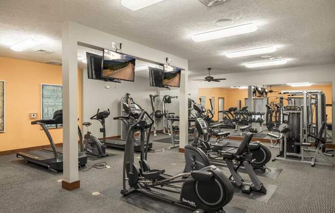 24-hour fitness center with cardio equipment at Villas of Omaha townhome apartments in northwest Omaha NE 68116