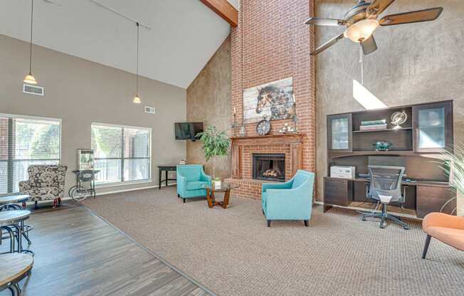 A living room with a fireplace and a television.