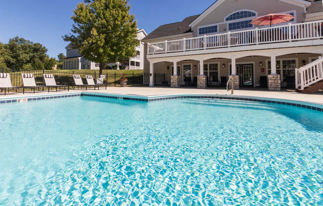 This is a photo of the pool area at Trails of Saddlebrook Apartments in Florence, KY.