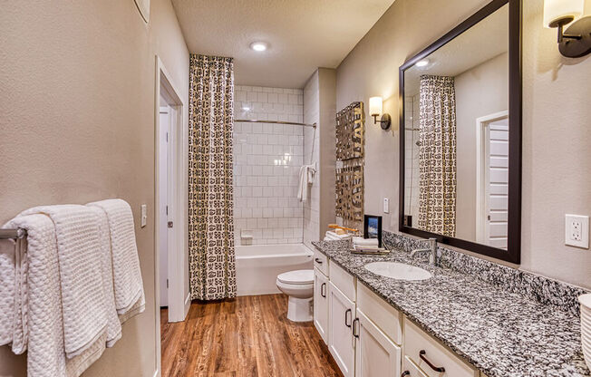 Designer Granite Countertops In All Bathrooms at The Parker at Maitland Station, Florida
