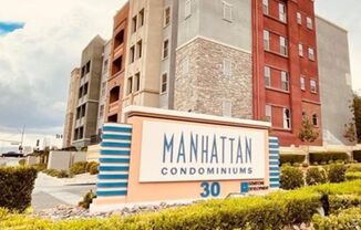 SPACIOUS BOTTOM FLOOR 2 BEDROOM IN THE GATED MANHATTAN CONDOS