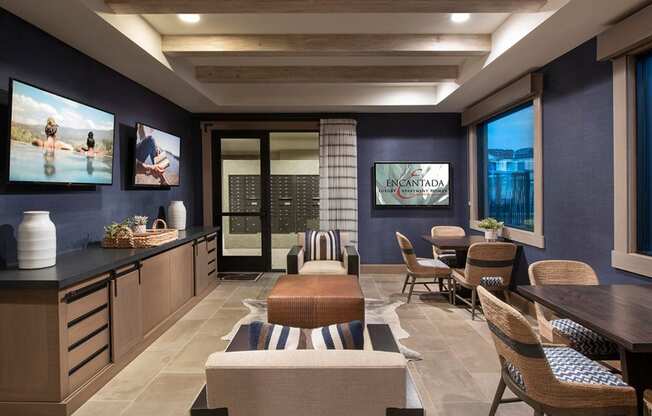 a living room filled with furniture and a large window