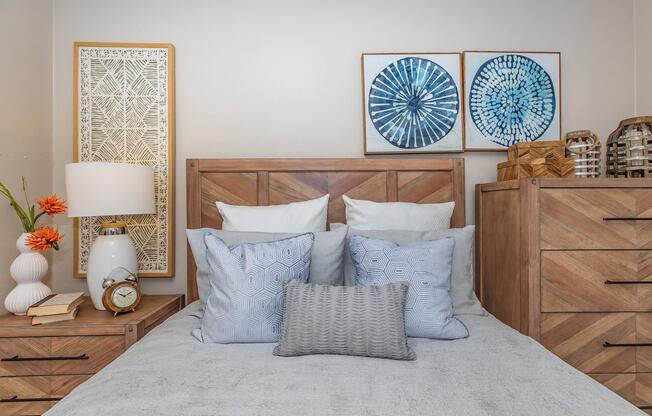 a bedroom with a bed in a room