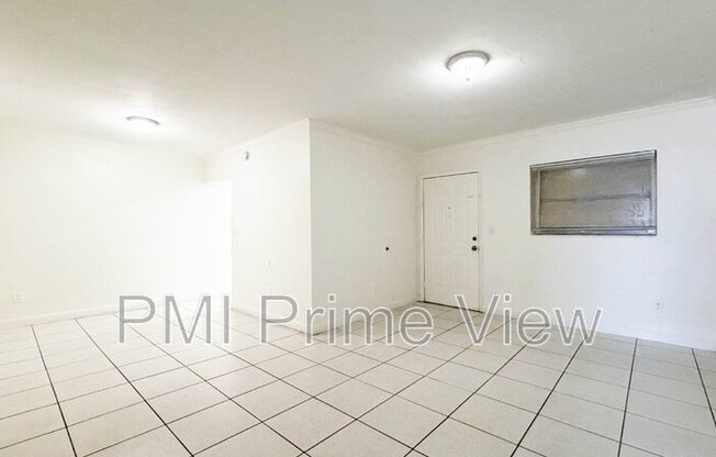 1245 W 24 ST