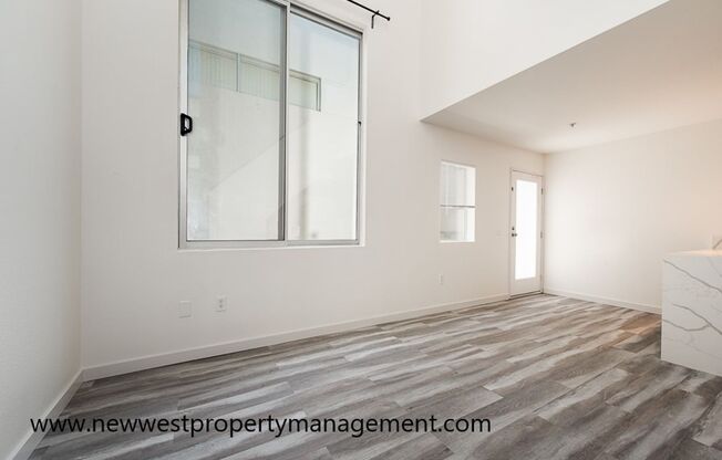 Light and Bright Little Italy Loft at Titan Lofts! Small Pet OK!