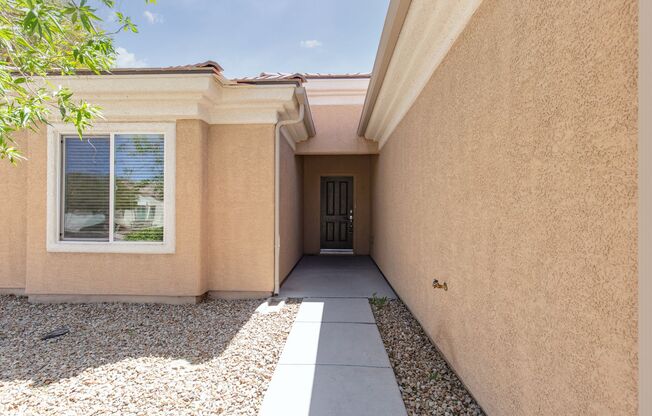 Single story Sun City Aliante home with views of the golf course