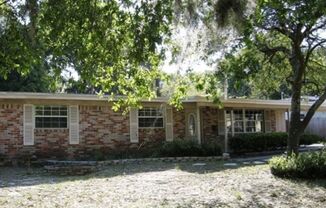 Charming Brick Ranch with Spacious Living - Prime Location Near Blue Cypress Park!