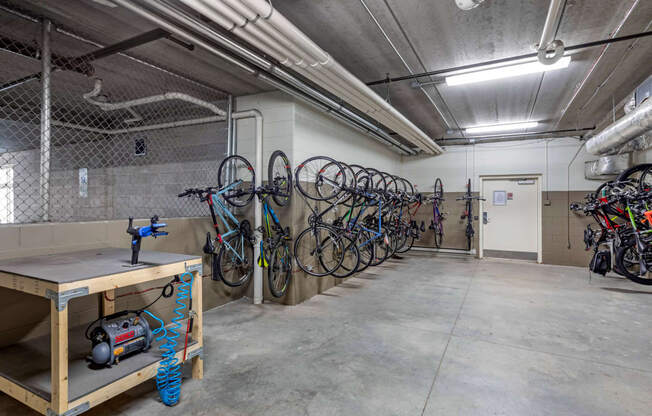 Bike storage and repair room at The Enclave Luxury Apartments