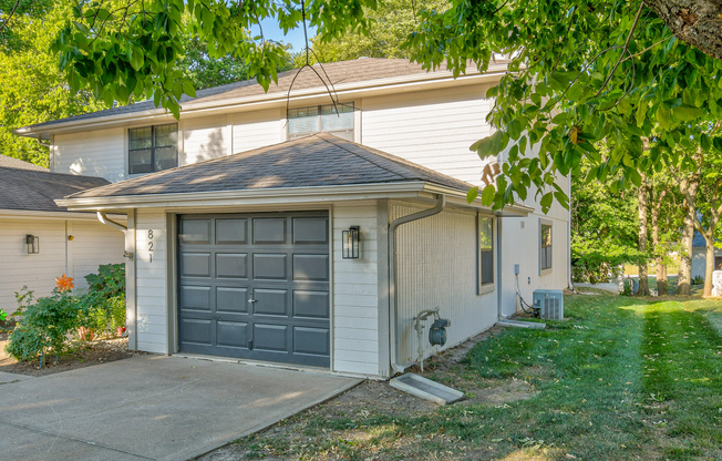 Townhome garage exterior at The Arbor in Blue Springs, Missouri