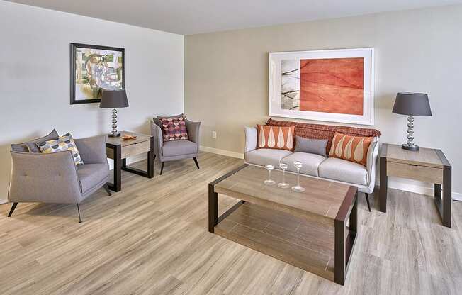 a living room with a couch chairs and coffee table  at 3030 Lake City, Seattle, Washington