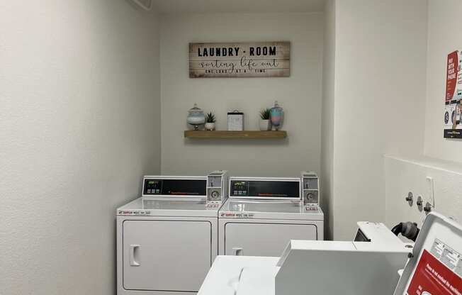 Laundry Care Center at The Imperial Apartment Homes in Santa Ana, California.