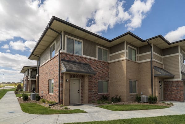 Exterior view of private entrances at The Villas at Falling Waters townhomes for rent in west Omaha NE