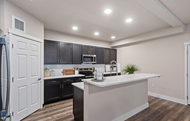 2 beds, 2 baths, 1,199 sqft, $1,750, Unit J-402