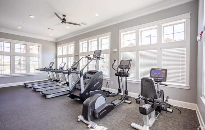 the gym is equipped with state of the art cardio equipment and windows