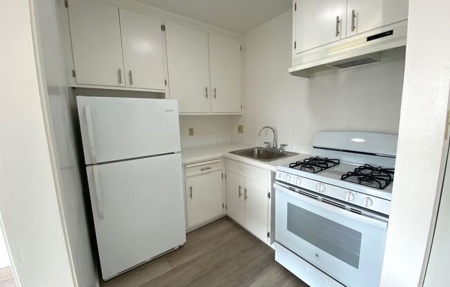 Open House Sat. July 5th from 12-1 PM: Updated top-floor 2-bedroom 1-bath corner apartment with a private balcony near BART