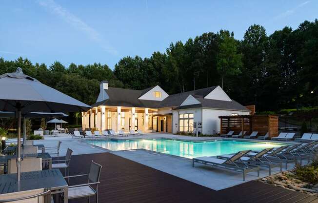 A large house with a pool in the backyard.