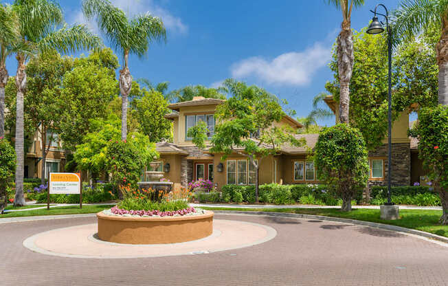 A beautifully landscaped entrance to a residential community.