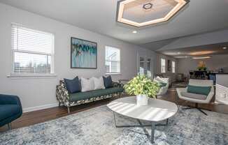 a living room with a couch and a table