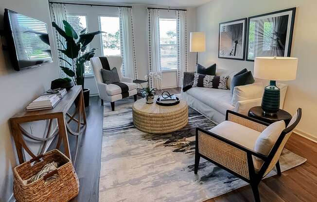 Model living room   at Two Addison Place Apartments , Georgia