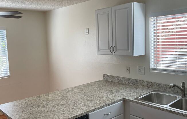 Bright and Charming 3 Bedroom 2 Bath Condo with Patio and A/C!