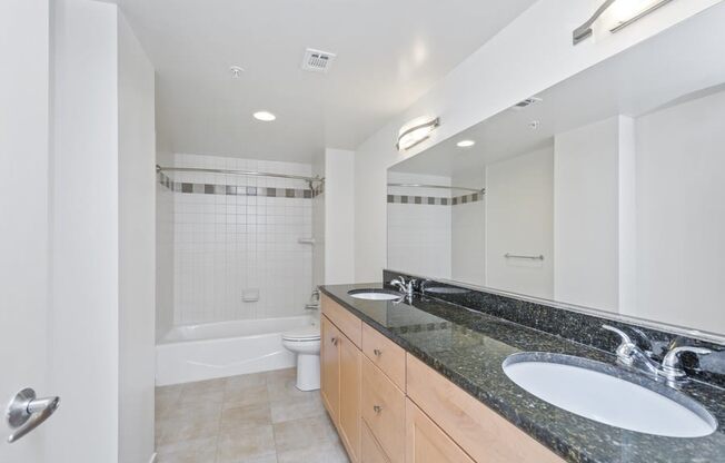 Extended Vanities with Granite Counters & Great Storage