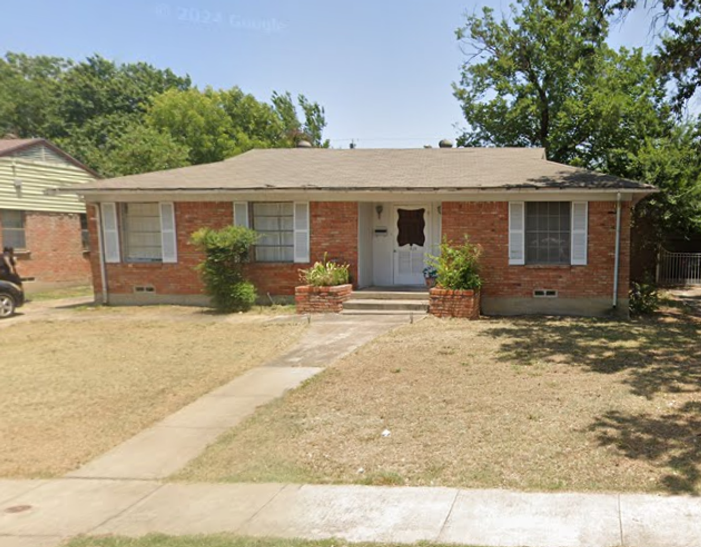 3 Bed 2 Bath Brick Home with Laundry Hookup and Detached Garage