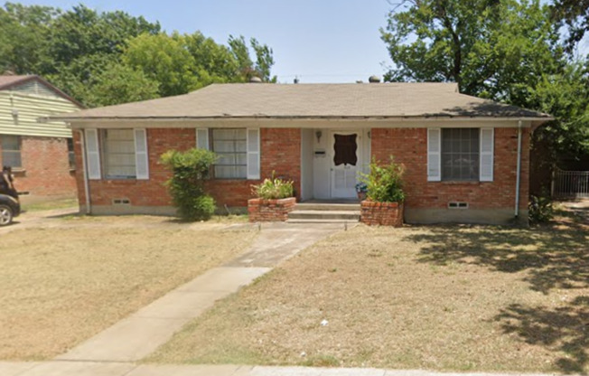 3 Bed 2 Bath Brick Home with Laundry Hookup and Detached Garage