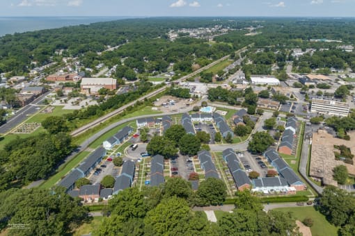 an aerial view of a parking lot in a city