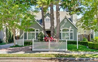 Stunning two-story spacious home on tranquil tree-lined street.