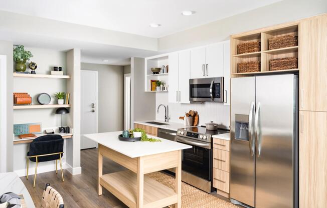 An open kitchen at Modera McGavock, featuring upscale finishes and flexible space, with quick access to Nashville’s dining, music, and everyday essentials.