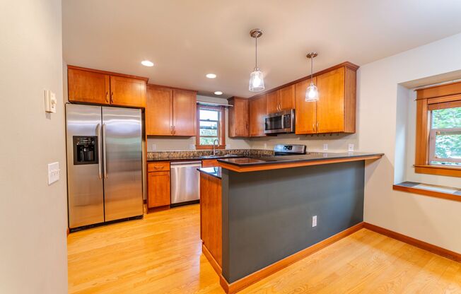 Beautiful 2BR/1.5BA Corner Townhome in the Heart of West Seattle | Private Yard + Garage